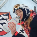My Voronskaya Moment: Person in ski gear drinking from a bottle with a blurred background