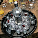 Vodka Ștefan cel Mare - Vodka bottle with shot glasses on a black tray