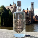 Vodka Ștefan cel Mare - Bottle of vodka with a decorative label in front of a canal and buildings