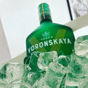 Vodka Voronskaya Bio - Voronskaya vodka bottle on a bed of ice with a blurred background