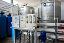 Voronskaya Vodka Factory - Industrial water treatment system with tanks and machinery in a facility.